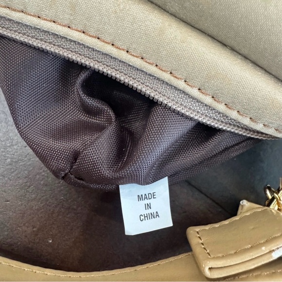 MCM Mini Top Handle Bag
Champagne Monogram Leather - Picture 12 of 15